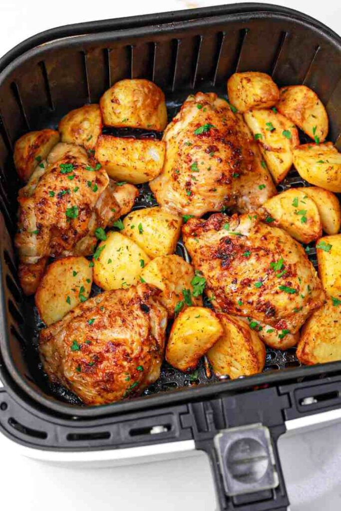 Crispy Air-Fried Chicken Thighs with Seasoned Potatoes